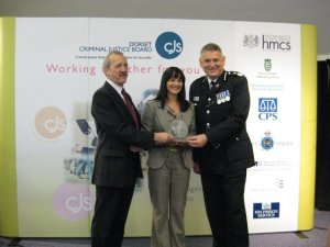 Winning the inidiviual category for 'Outstanding Contribution to Engaging Local Communities' with the Chief Constable of Dorset Police.